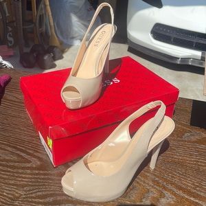 Never worn. Women’s Guess heels. White natural synthetic